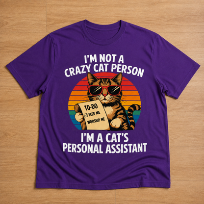 Gift for Cat Lovers "I'm not a Crazy Cat Person. I'm a Cat's Personal Assistant" - Adult Unisex and Youth Premium Cotton T-Shirt DTF Print