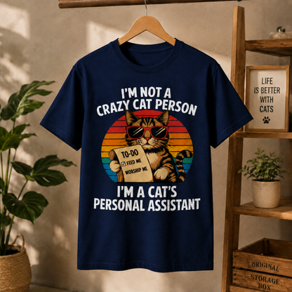 Gift for Cat Lovers "I'm not a Crazy Cat Person. I'm a Cat's Personal Assistant" - Adult Unisex and Youth Premium Cotton T-Shirt DTF Print